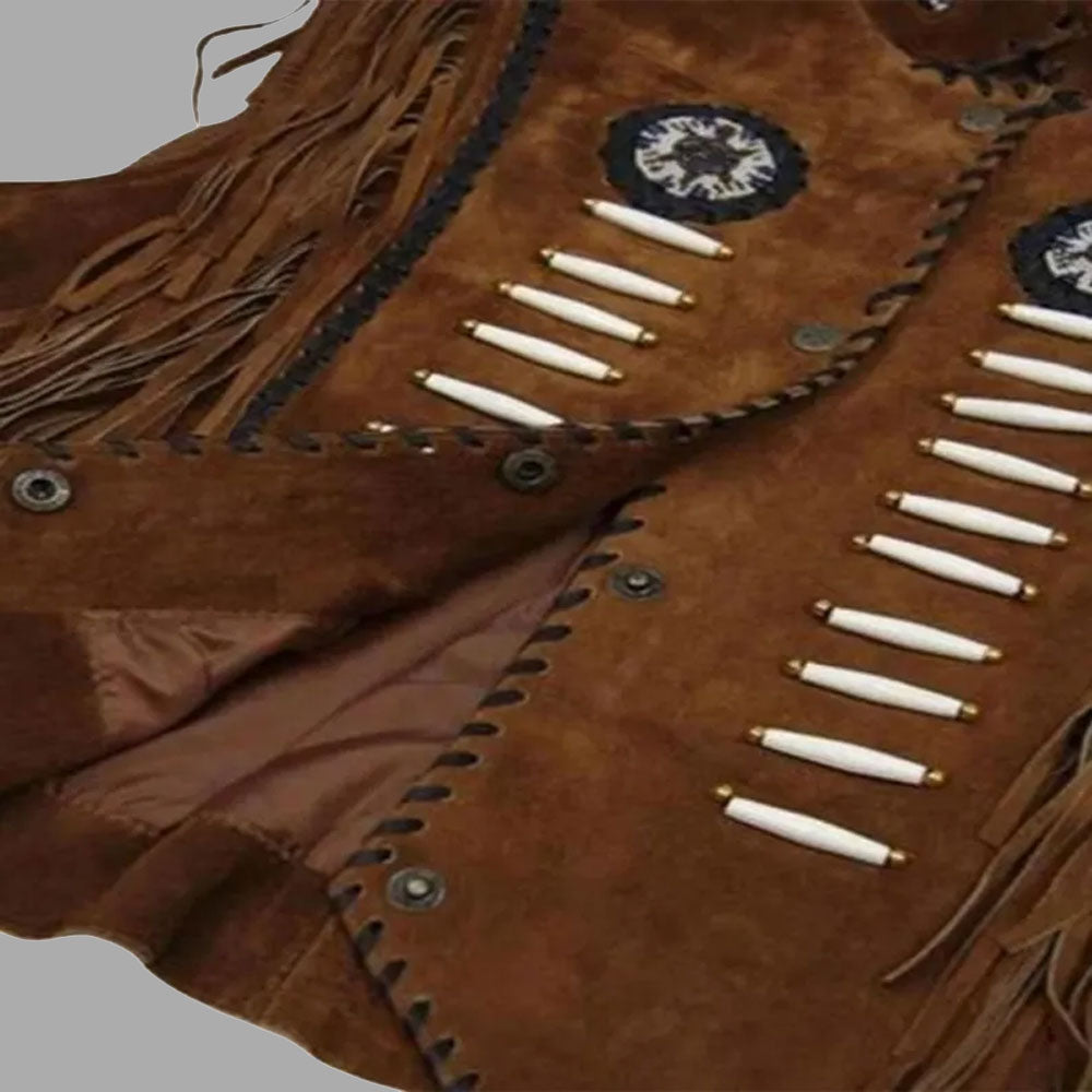 Close-up image showing intricate beaded embellishments and suede fringe craftsmanship on the Sundown cowboy vest, highlighting handmade artistry.