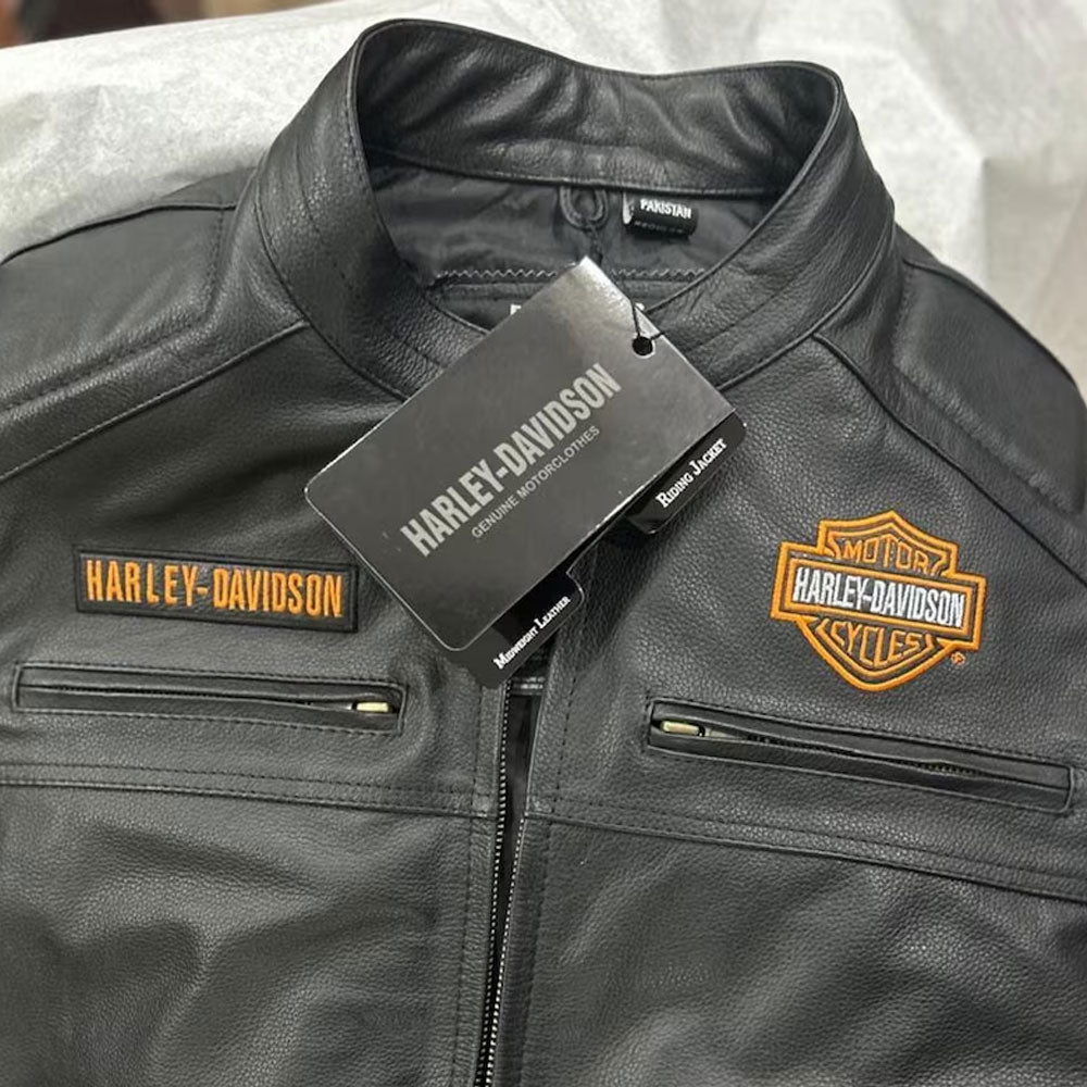 Close-up view of the Harley Davidson Black Leather Vest texture, highlighting the natural grain of premium black cowhide leather. The detailed stitching and fine finish enhance its luxurious biker appeal and showcase the craftsmanship behind this rugged motorcycle vest.