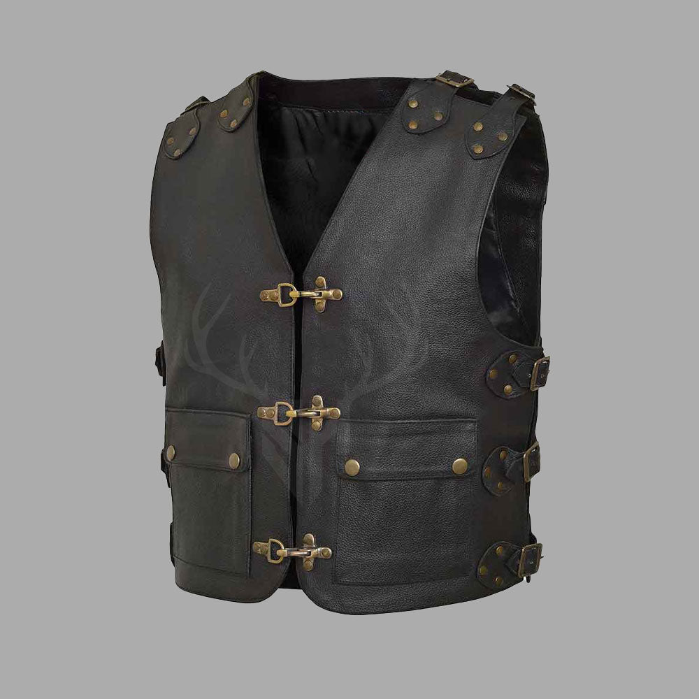 Detailed close-up of Gravemarch MC Vest showing buffalo leather texture, snap hook closure hardware, and precision hand-stitched seams on matte black leather surface.