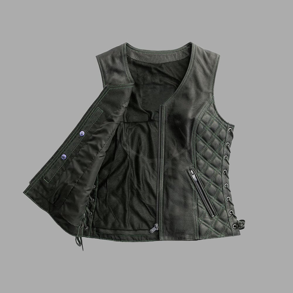 Fringed cowhide leather vest designed for female motorcycle riders, combining durability with a rebellious aesthetic and customizable patch-ready surface.
