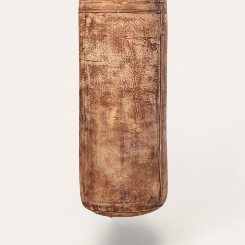 A detailed close-up of the cowhide leather surface and classic retro lacing on the Gravestone Heritage Punching Bag. Perfect for showcasing the quality craftsmanship, rugged hand-stitched seams, and raw, vintage aesthetics built for professional training and long-lasting use.