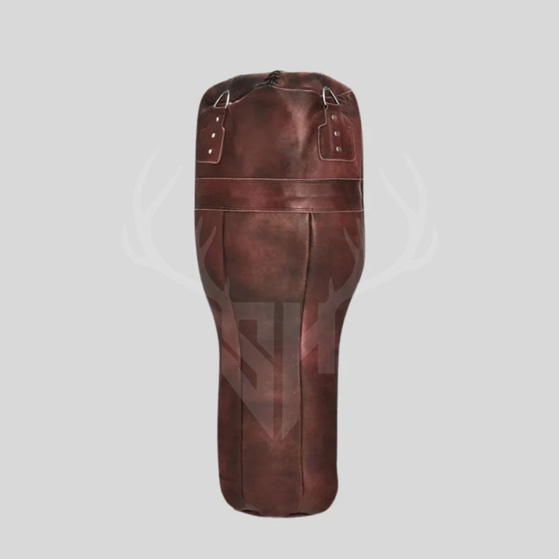Studio shot of the Ironclad Titan Uppercut Boxing Bag against a plain white background, highlighting the bag’s vintage uppercut design, rugged cowhide leather texture, and professional craftsmanship. The clean backdrop emphasizes its premium quality, making it ideal for product listings, marketing materials, and e-commerce platforms focused on boxing and MMA training equipment.
