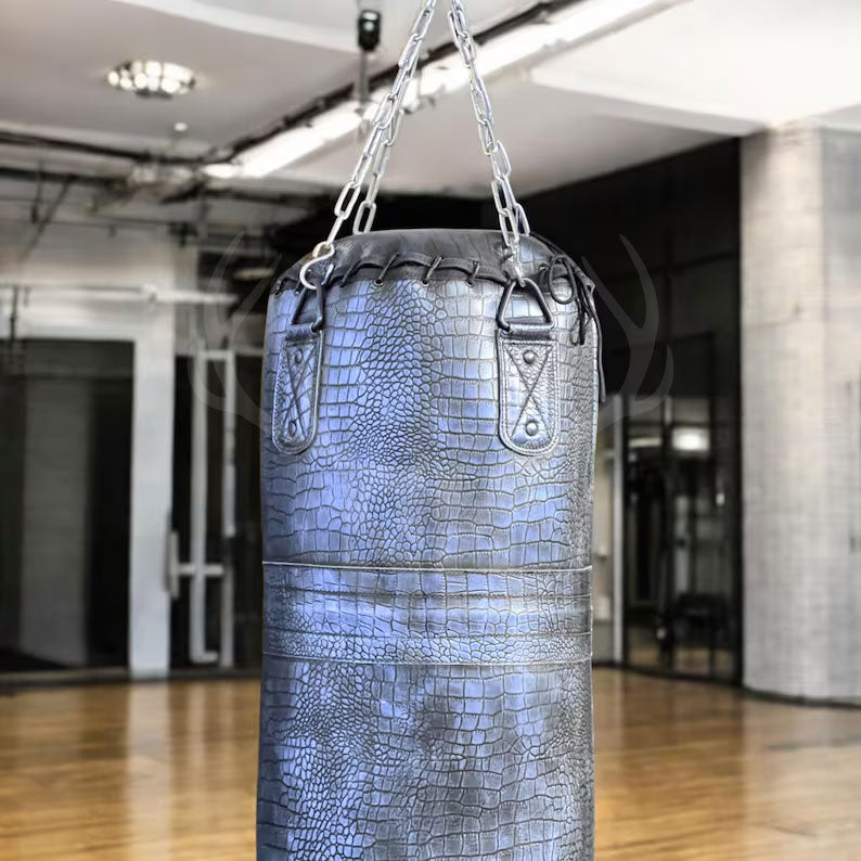 Close-up of the reinforced hand-stitched seams on the Azure Mauler blue punching bag, showcasing craftsmanship and durability for long-lasting use in high-impact boxing and martial arts training.