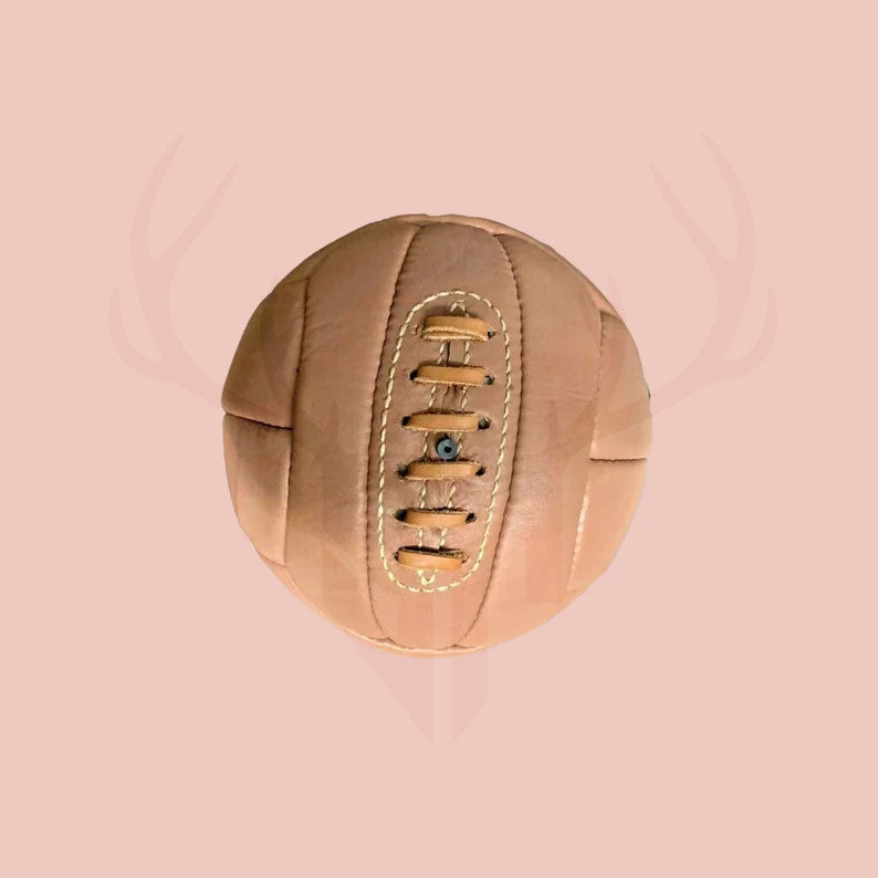 The 1938 vintage soccer ball shown in display packaging, ideal as a gift or collectible centerpiece. Hand-stitched full-grain cowhide leather makes it a perfect present for soccer lovers and sports historians.