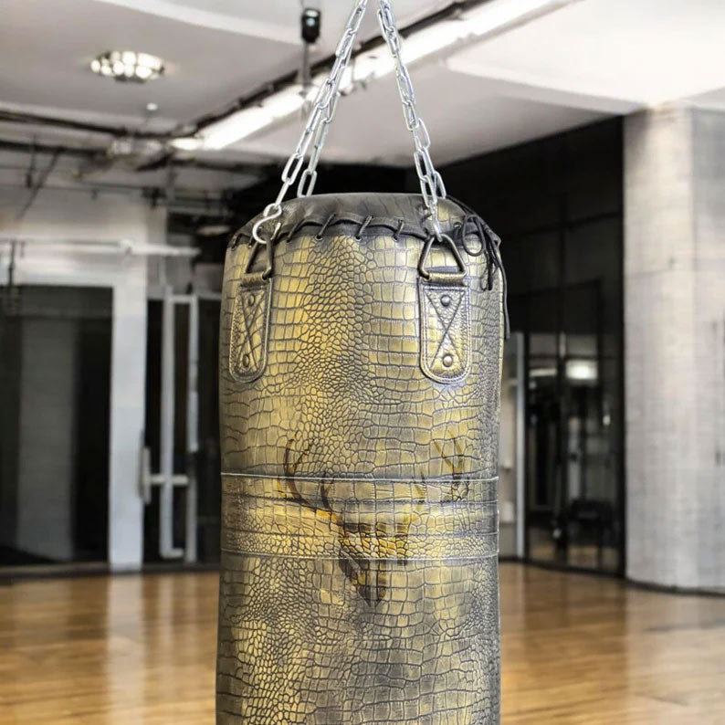 Heavy-duty stainless steel hanging chain on Golden Croc Leather Heavy Punching Bag. Designed for secure suspension in home gyms and commercial fitness centers.