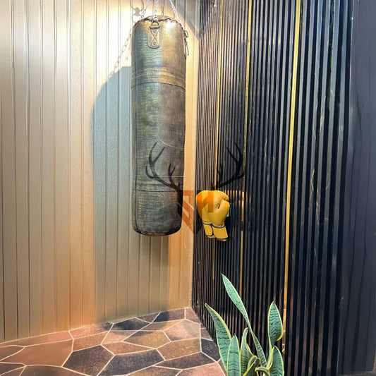 Side profile of Golden Croc Leather Heavy Punching Bag showing crocodile-embossed genuine cowhide leather. Heavy-duty with reinforced seams, ideal for boxing, MMA, and kickboxing workouts.