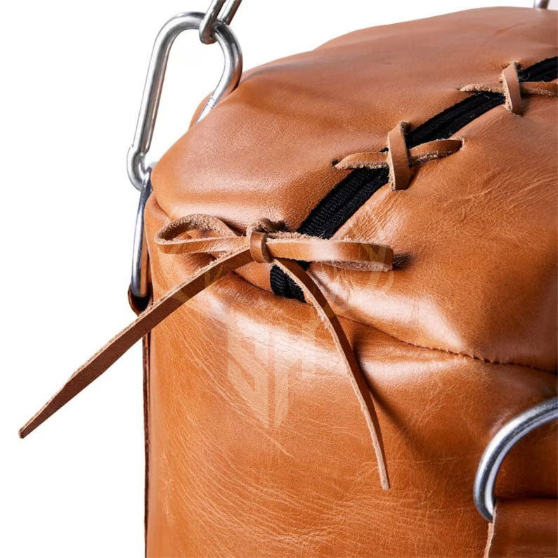 Detailed image of the Sundown punching bag’s natural cowhide leather texture, showcasing the fine grain and vintage tan color. Perfect for trainers seeking a rugged yet stylish punching bag with long-lasting material.