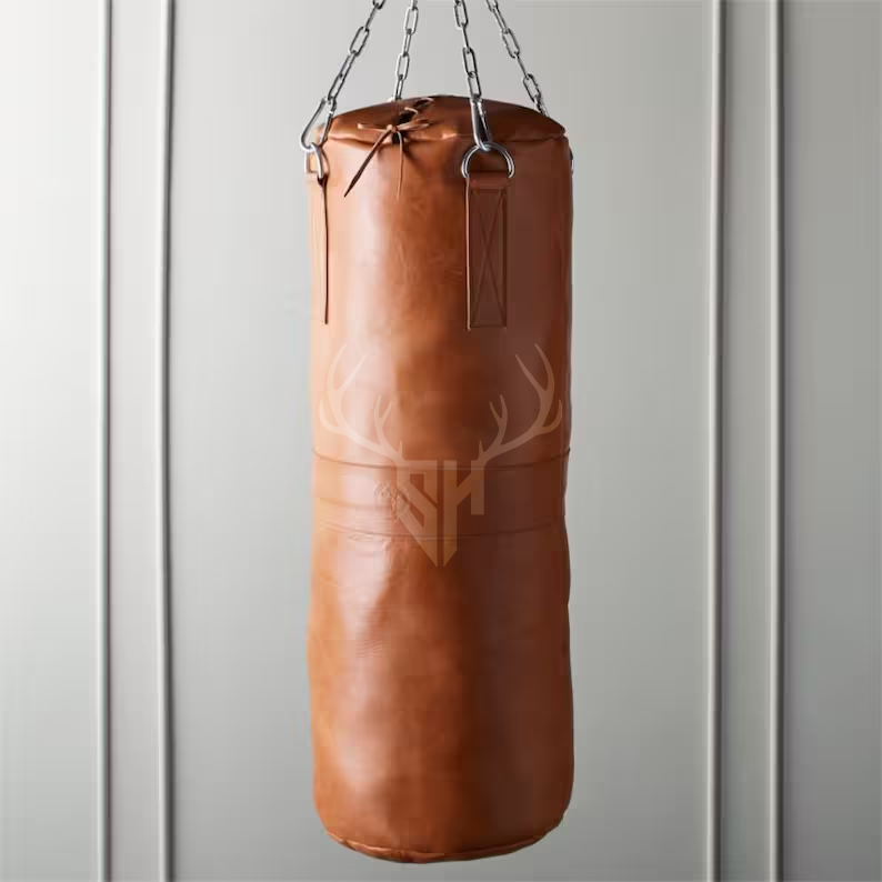 Close-up showing the rich grain texture of the Sundown punching bag’s premium tan cowhide leather. Reinforced stitching and high-quality hardware highlight the craftsmanship and durability built for intense training.