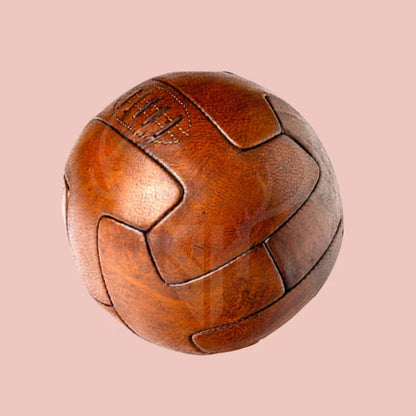vintage leather soccer ball, 1930 World Cup football, handmade leather football, T-panel style soccer ball, antique football, retro soccer ball, collectible soccer ball, leather football gift, classic soccer ball, historic football replica, genuine leather football, World Cup memorabilia, soccer gift for him, football history gift, handcrafted soccer ball, vintage sports gear, customizable soccer ball, display soccer ball, football collector’s item, handmade vintage sports ball









