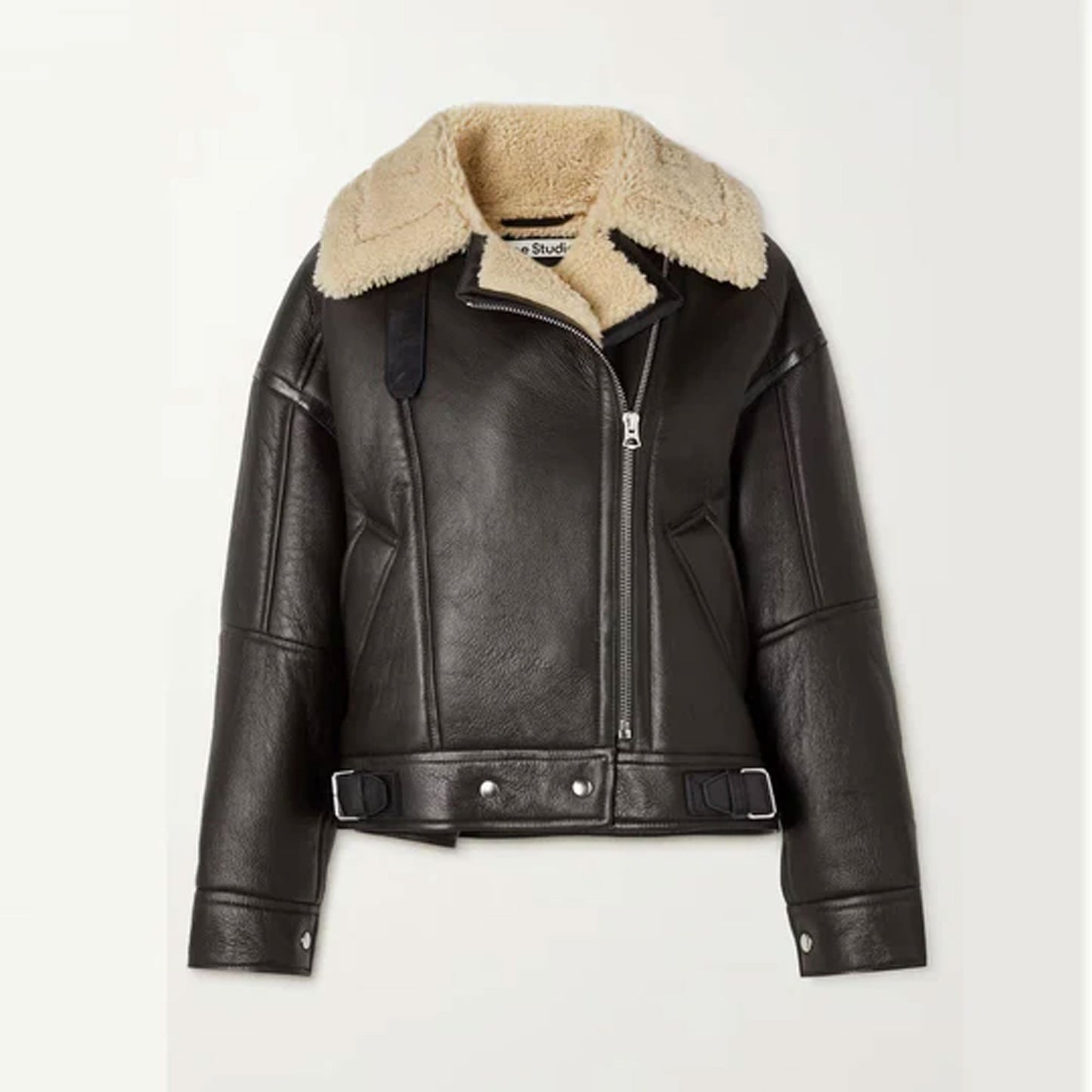 Women’s Aurora black aviator shearling leather jacket crafted from genuine cowhide with plush cream shearling lining, cropped biker silhouette with adjustable belt straps, zipper closure, and classic wide collar. Designed for winter streetwear, luxury fashion, and timeless biker chic outfits that deliver warmth and modern elegance.