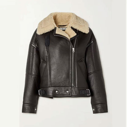 Women’s Aurora black aviator shearling leather jacket crafted from genuine cowhide with plush cream shearling lining, cropped biker silhouette with adjustable belt straps, zipper closure, and classic wide collar. Designed for winter streetwear, luxury fashion, and timeless biker chic outfits that deliver warmth and modern elegance.
