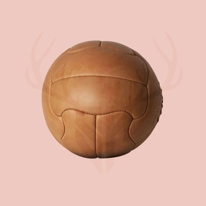 Detailed side view of authentic 1950 World Cup replica leather soccer ball, highlighting aged cowhide texture, full-grain leather lacing, and Duplo T paneling for collectors and vintage soccer enthusiasts.

