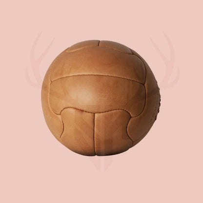 Detailed side view of authentic 1950 World Cup replica leather soccer ball, highlighting aged cowhide texture, full-grain leather lacing, and Duplo T paneling for collectors and vintage soccer enthusiasts.

