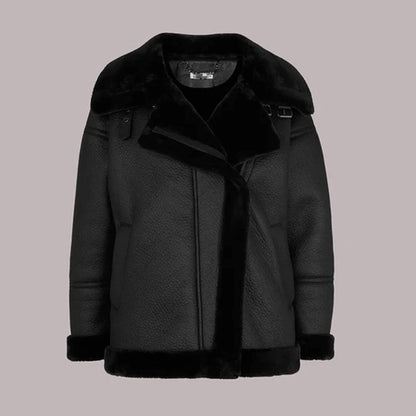 Front view of the Ebon Shearling Black Leather Jacket made from premium leather with full shearling lining, showcasing oversized fur collar, matte black finish, and winter-ready design perfect for luxury outerwear fashion.
