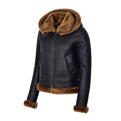 Premium black leather shearling bomber jacket with hood, designed for men and women who value style and functionality. Featuring a genuine leather exterior, soft brown fur lining, shearling cuffs, and hem, this winter coat provides insulation and durability. Perfect for travel, outdoor wear, or everyday city fashion, this versatile shearling-lined aviator jacket blends comfort with timeless bomber style for cold weather protection.