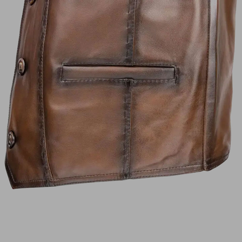 Close-up of the side lace closure system on the retro brown vest, offering adjustable fit and a traditional motorcycle vest aesthetic.

