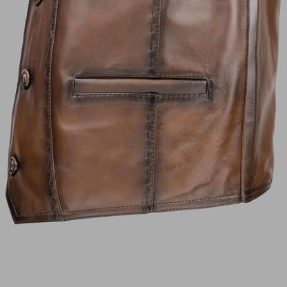 Close-up of the side lace closure system on the retro brown vest, offering adjustable fit and a traditional motorcycle vest aesthetic.

