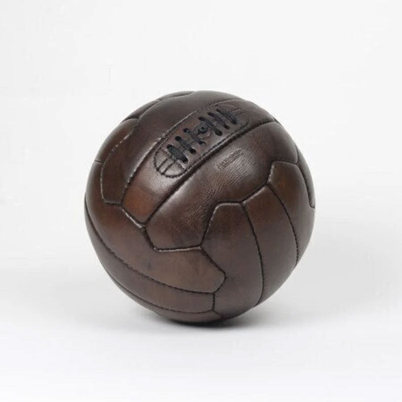 Classic handmade football ball with timeless design and collectible appeal


