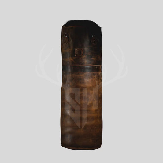 Close-up of the Legacy Striker punching bag made from genuine hand-dyed cowhide leather. The high-quality finish, detailed stitchwork, and stainless steel chain system are visible, emphasizing durability and craftsmanship. Perfect for boxing, kickboxing, and martial arts training. Designed for athletes who demand long-lasting gear and aesthetic appeal in their home or commercial gym.


