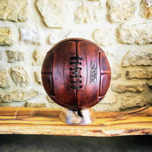 Handcrafted vintage leather football inspired by 1930s design, made from veg-tanned cowhide and perfect for collectors, sports lovers, or display.