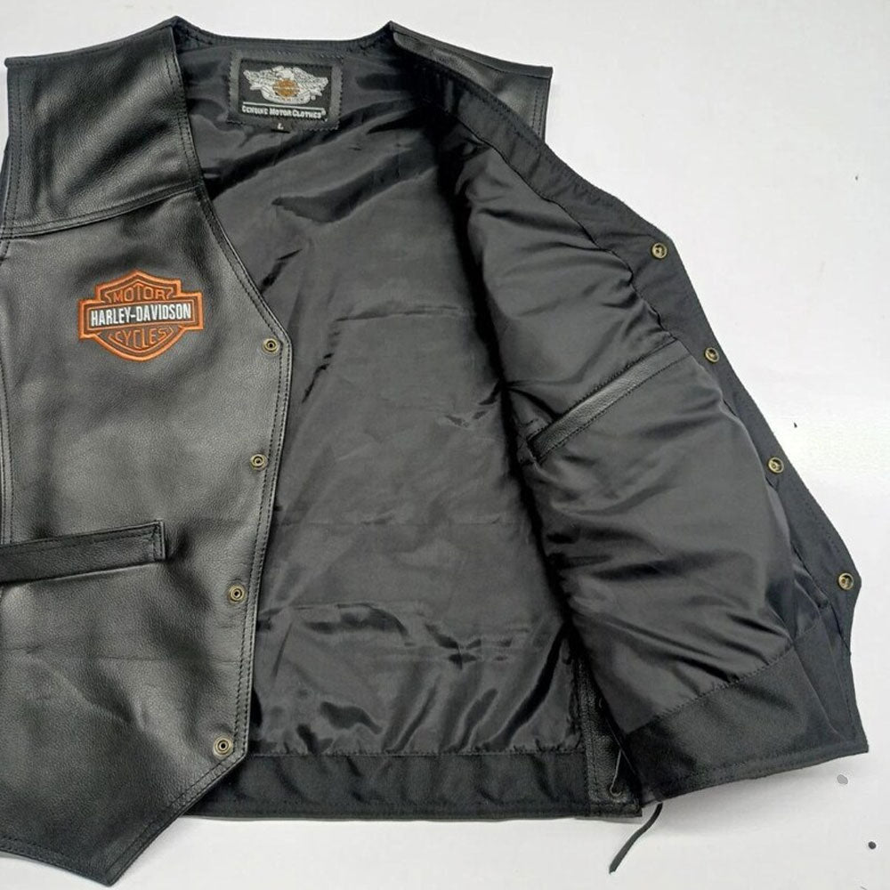Interior view of the Harley Davidson café racer vest showing the smooth satin lining, designed for all-season comfort. The genuine cowhide exterior and soft inner lining make it an excellent choice for motorcycle riding in varied weather conditions.

