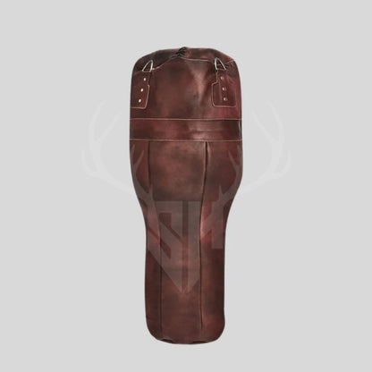 Studio shot of the Ironclad Titan Uppercut Boxing Bag against a plain white background, highlighting the bag’s vintage uppercut design, rugged cowhide leather texture, and professional craftsmanship. The clean backdrop emphasizes its premium quality, making it ideal for product listings, marketing materials, and e-commerce platforms focused on boxing and MMA training equipment.


