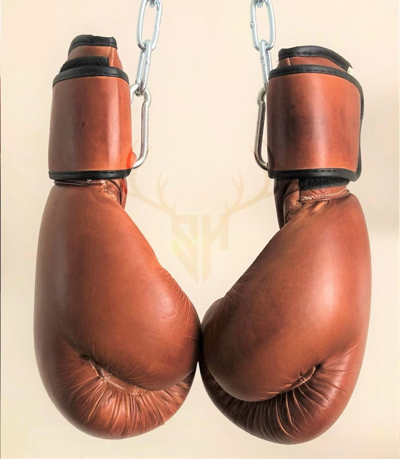 Premium cowhide boxing gloves with vintage finish and dual strap lock system – ideal for MMA and boxing training.