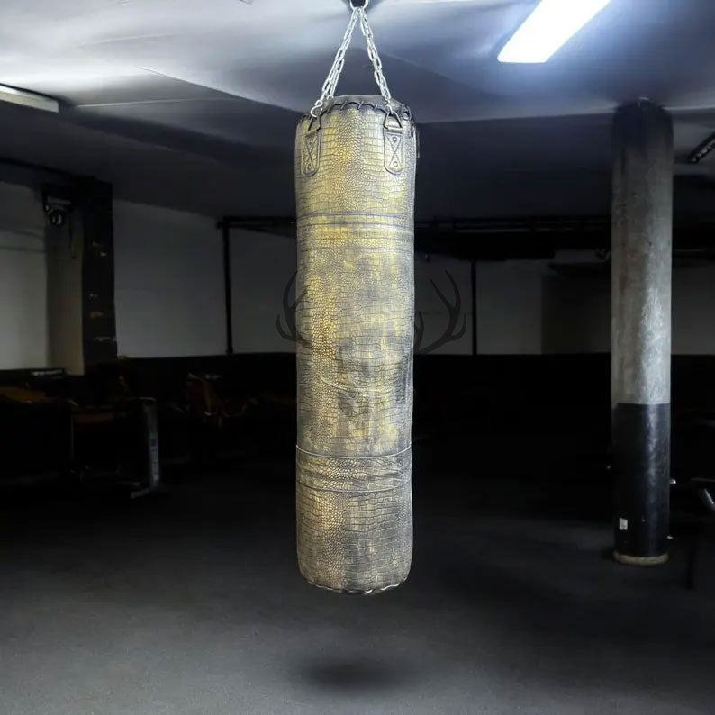Front view of Golden Croc Leather Heavy Punching Bag made from premium genuine cowhide with crocodile embossing. Durable, handcrafted with reinforced stitching. Perfect for MMA, boxing, kickboxing, and fitness training.