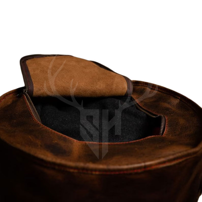 Detailed close-up of the cowhide leather punching bag’s grain, hand-stitching, and chain attachment point. Highlights premium craftsmanship and rugged performance built into the Legacy Striker heavy bag.

