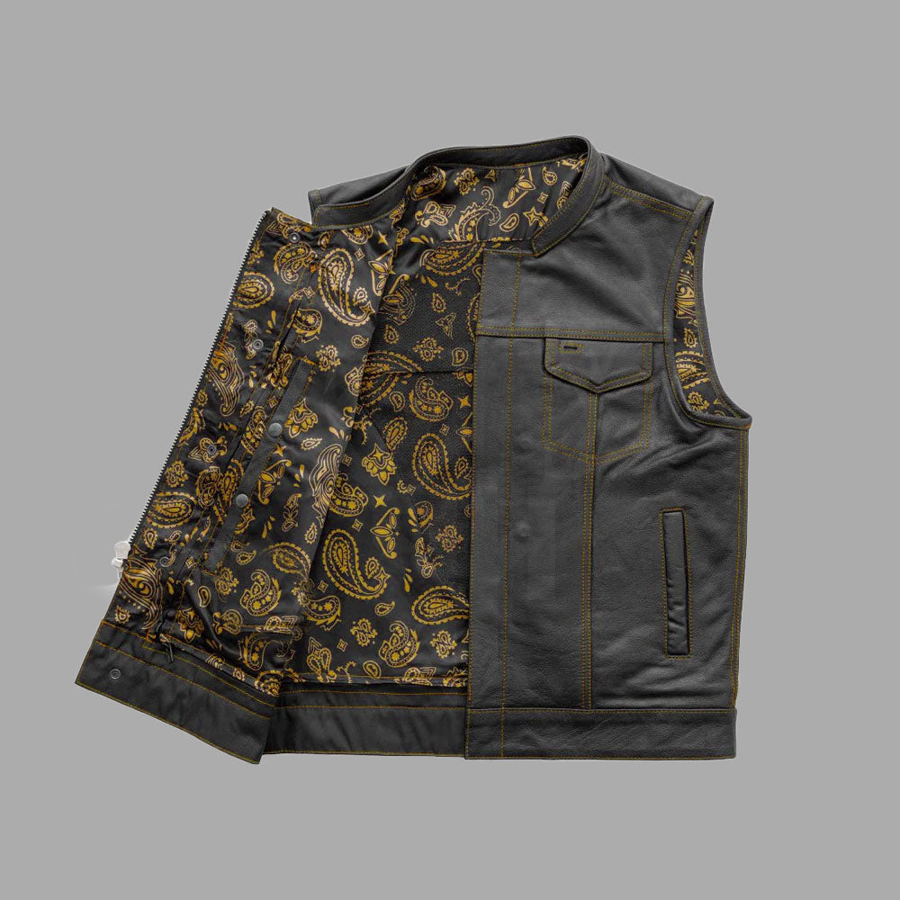 Interior focus image of Yellowforge biker vest showing printed yellow lining in breathable polyester, brass snaps, and handstitched interior. Designed for SEO like “motorcycle leather vest yellow printed polyester lining.