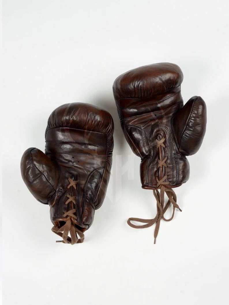 Front view of Retro Vintage Brown Heavy Leather Boxing Gloves with full grain cowhide construction, brown patina finish, and lace-up closure – perfect for boxing training, MMA, Muay Thai, and collectors.