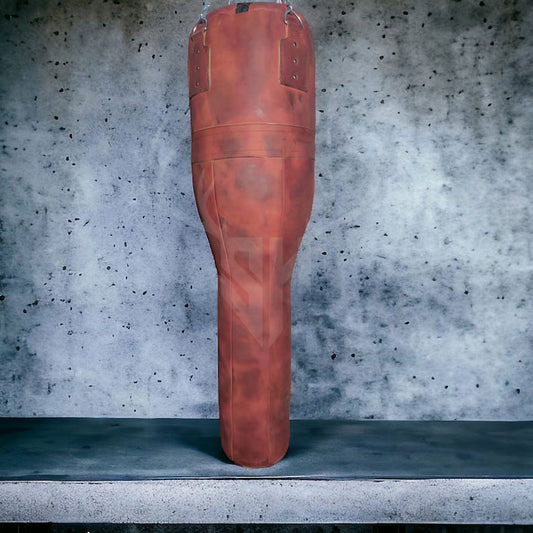 Side view of the Striker Uppercut punching bag highlighting the thick leather panels, detailed hand-stitching, and sturdy stainless steel hanging chain. The image emphasizes the bag’s compact yet robust design suitable for professional training and home gym setups.

